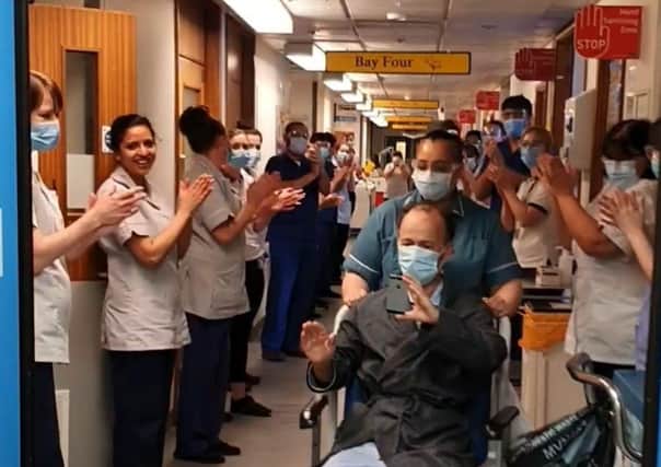 Hylton Murray-Philipson receives a guard of honour from staff at the Leicester Royal Infirmary back in April 2020 after recovering from being in intensive care with the Covid-19 virus EMN-210803-110709001