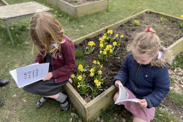 Thrussington Primary School pupils read copies of 'The Little Book of Lockdown Positivity' EMN-210323-133442001