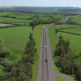 A still showing simulated drone footage of the planned Melton Mowbray Distributor Road (MMDR) EMN-210325-175512001