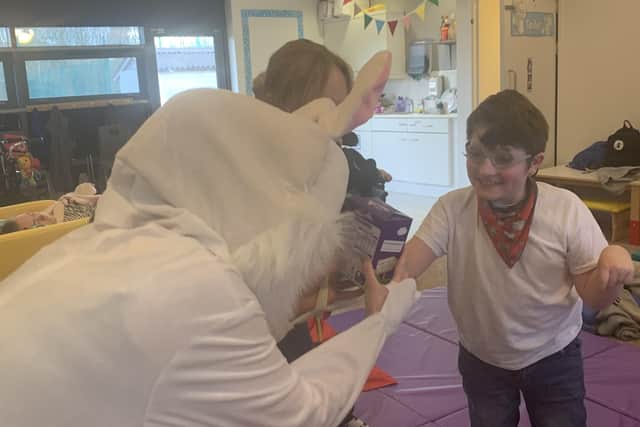 A Birch Wood School student is thrilled to receive one of the 261 Easter eggs collected by villagers at Bottesford EMN-210326-115940001