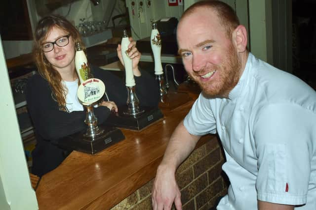 Dom Clarke, with partner Antonia Nelmes, at The Stag and Hounds pub at Burrough on the Hill EMN-210329-123148001