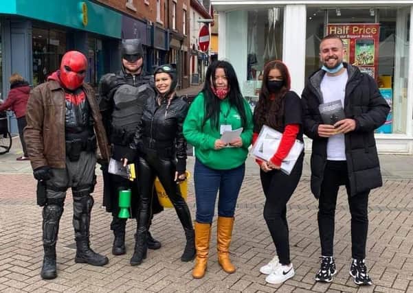 Superheroes join representatives of the Unlock Your You mental health charity at a recent event in Melton - they will be giving out Easter eggs to Melton families on Easter Monday EMN-210104-174124001