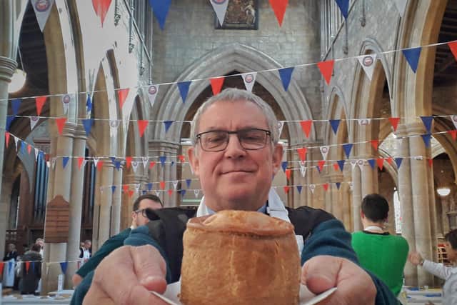 The Rev Kevin Ashby, Rector of Melton, launches the British Pie Awards judging with the traditional blessing of the pies EMN-200403-133355001