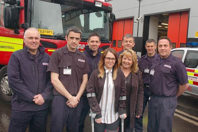 Flashback to April 2017 - Katie Pease, with mum Georgina, thank Melton firefighters for their response when she was left badly injured and trapped in the wreckage of her car after a collision near Melton EMN-200403-172447001