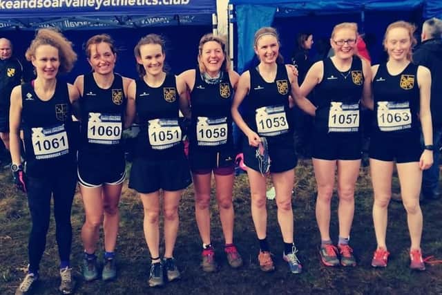 Katie Hateley (centre) with the Leicestershire and Rutland team at the National Cross Country Championships EMN-201003-104718002