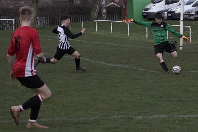 Semi-final action at Thurmaston as Rangers clear the danger EMN-201003-180130002