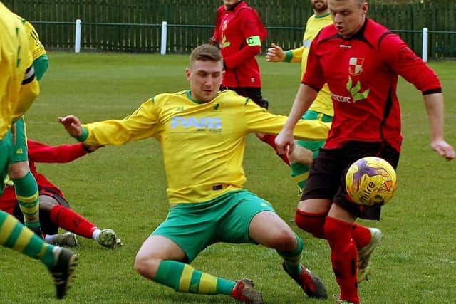 Centre-half Ross Dunlop restored Town's lead in an impressive display EMN-200315-125214002