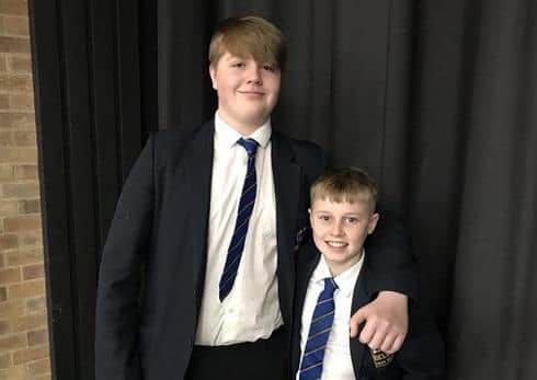Jack Jackson (left) with Keiron Stanley. Jack raised the alarm and did some crowd control to ensure Jack Thompson had space following a cardiac arrest while Keiron ran to the school to fetch the defibrillator EMN-200313-093657001