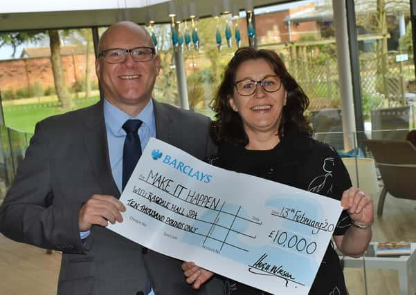 Ragdale Hall Spa directors Hugh Wilson and Allison Garner with a cheque for £10,000 to be allocated once again to community groups, charities and clubs through our Make It Happen funding scheme EMN-200313-123421001