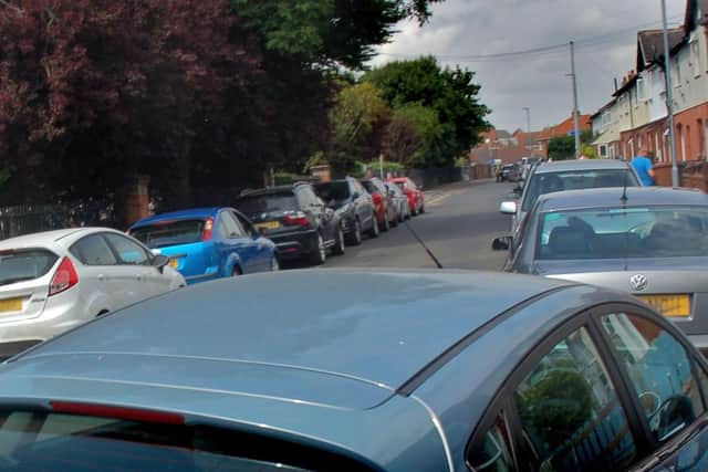 Parked cars in Melton - there may soon be a ban on parking on pavements EMN-200313-110957001