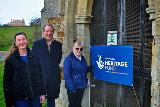 Members of St Andrews' Church at Coston celebrate a £76,000 Lottery grant, from left Henrietta Chubb, a member of the congregation, churchwarden David Chubb and parochial church council secretary Ann-Marie Green EMN-200313-152934001