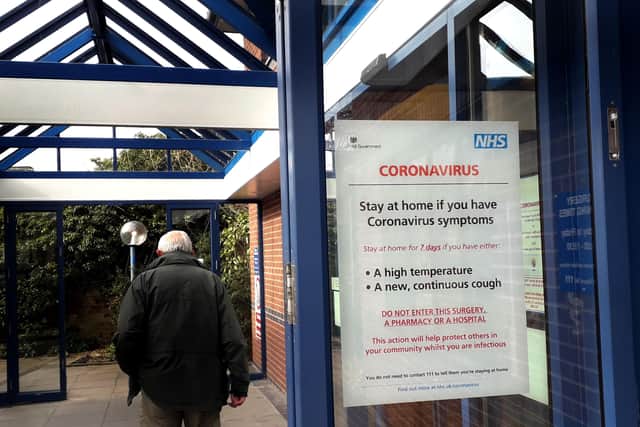 A coronavirus advice notice at Latham House Medical Practice EMN-200318-094514001