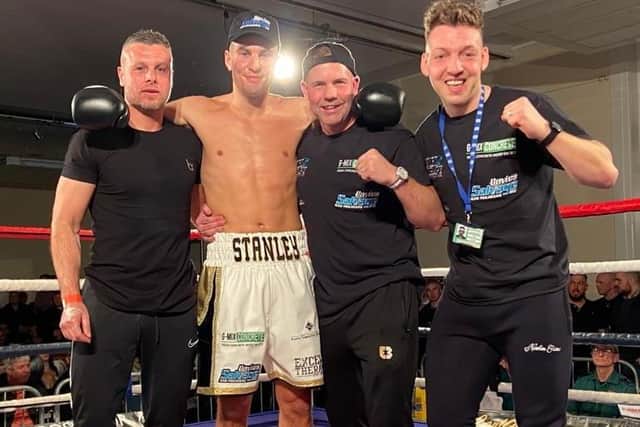 Stannard with his coaching team, including a disbelieving trainer Carl Greaves (second right) EMN-200318-101722002