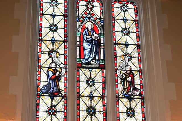 The restored and reinstalled historic stained glass window at Melton's St John's Catholic Church EMN-200318-104437001