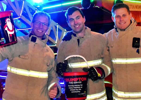 Firefighters Brent Penniston, Mark Bean and Matt McMullan PHOTO: Tim Williams