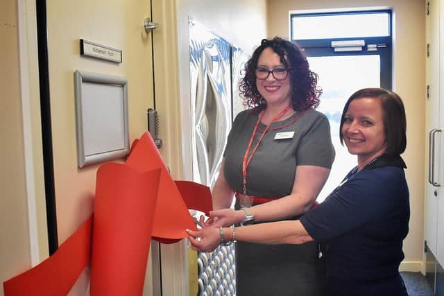 Kirstie Foulds (of sponsors HSBC) and Renee Downing (Birch Wood Area Special School's business manager) cut the ribbon to open the school's new Immersive RoomPHOTO TAKEN BEFORE NEW RESTRICTIONS ON SOCIAL DISTANCING EMN-200325-074653001