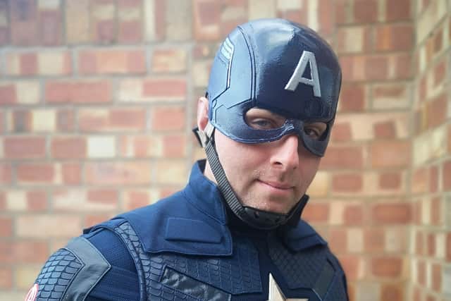 Steve Iornside, aka Captain America, delivers birthday messages to children on the Facebook forum EMN-200204-082730001