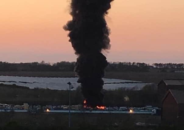 Black smoke pours from another fire at Asfordby Business Park EMN-200804-211445001