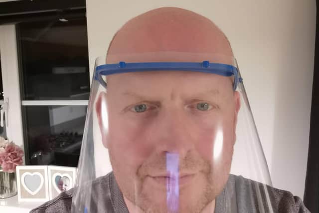 Melton Freemason Chris Parsons wearing one of the face masks he had produced for Covid-19 frontline workers EMN-201104-105341001