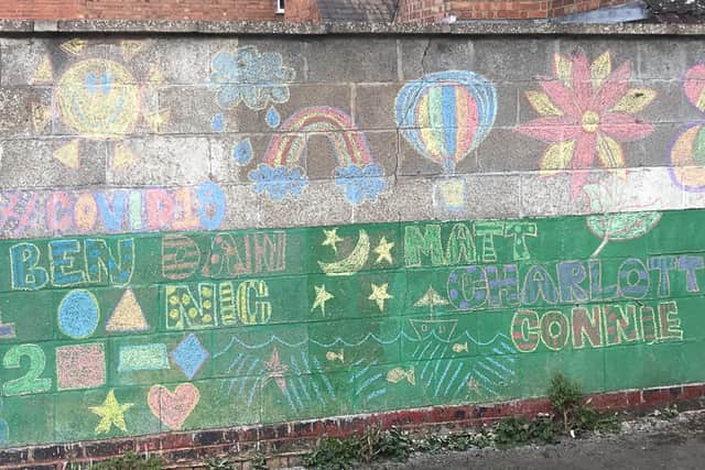 A wall at the Victoria Street car park which has been decorated by local families EMN-200415-083727001