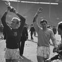 Bobby Moore and Gordon Banks celebrate winning the World Cup. Photo: GettyImages