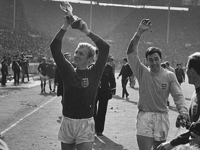 Bobby Moore and Gordon Banks celebrate winning the World Cup. Photo: GettyImages