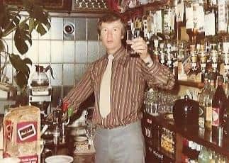 Ernie Pope behind the bar at the Half Moon in Melton EMN-200420-134736001