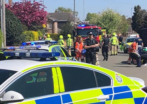 Emergency services on the scene following an incident in Norfolk Drive, Melton, where a car crashed into another vehicle and a house
PHOTO ROBERT LOCKWOOD EMN-200424-100043001