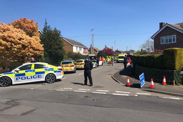 Emergency services on the scene following an incident in Norfolk Drive, Melton, where a car crashed into another vehicle and a housePHOTO ROBERT LOCKWOOD EMN-200424-100055001