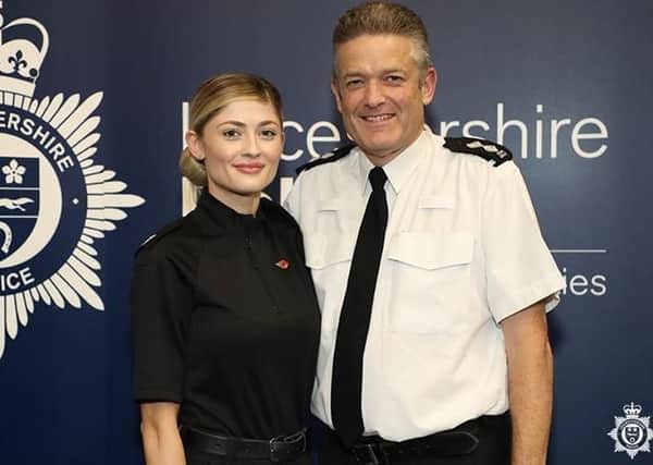 Former Melton police officer, Det Insp John Gray, with daughter Rebecca, who has followed him into the Leicestershire Police force EMN-200605-114559001