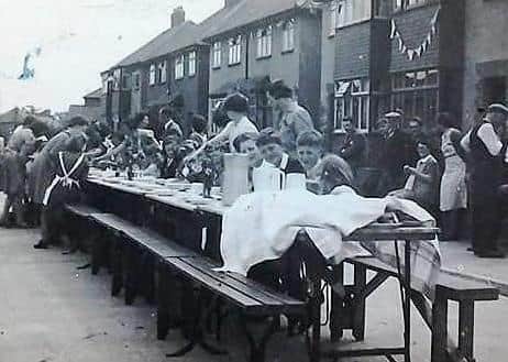 Residents in Elmhurst Avenue, Melton, pictured during VE Day celebrations in May 1945 EMN-200505-123156001
