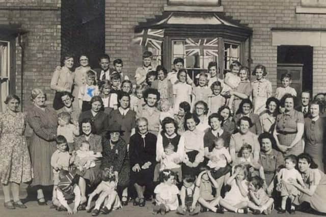 Brook Street residents pictured during Melton VE Day celebrations in May 1945 EMN-200505-123126001