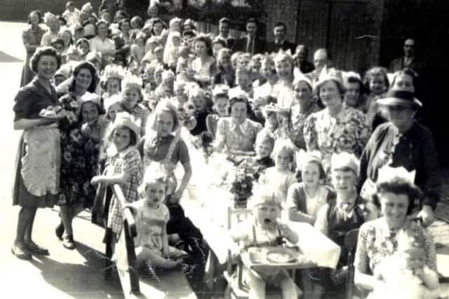A street party in full swing in Egerton Road, Melton, during VE Day celebrations in May 1945 EMN-200505-123136001