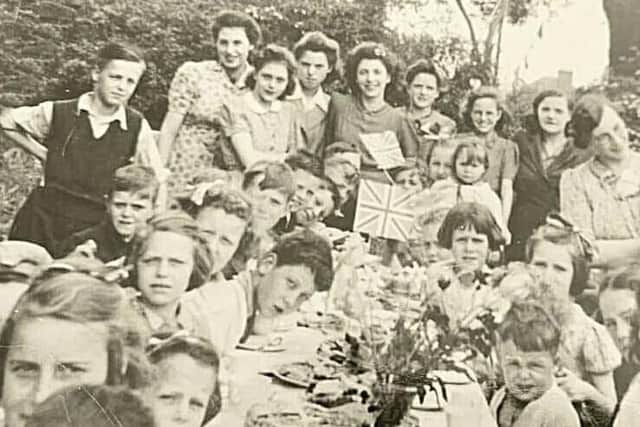 Welby Lane residents pictured during Melton VE Day celebrations in May 1945 EMN-200505-123246001