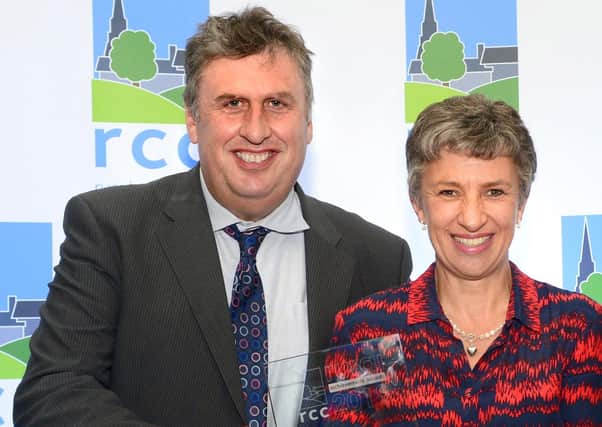 Somerby farmers Mark and Jane Barnes pictured receiving a rural business award last year EMN-201105-152720001