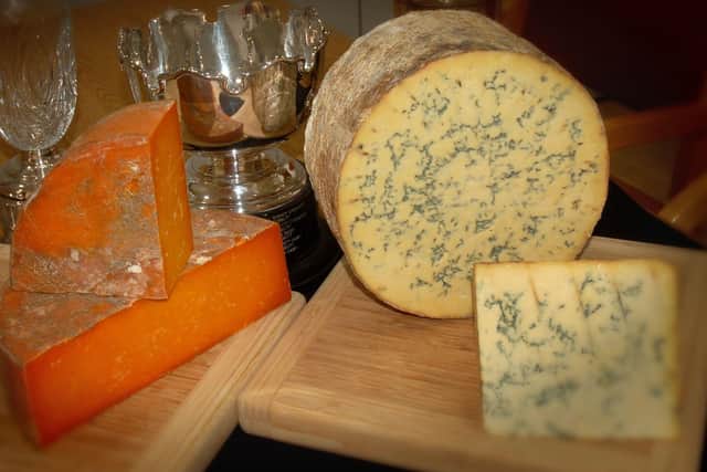 Long Clawson Dairy's champion cheeses from the 2018 Melton Fatstock Show, Blue Stilton and Rutland Red EMN-200518-130855001