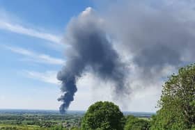 A thick plume of black smoke coming from a blaze at Langar Airfield
PHOTO Craig Atkins EMN-200521-161947001