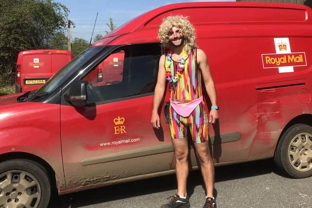 Postman Rob Davenport who raised £1,500 for the NHS by doing his round in fancy dress EMN-200526-102814001