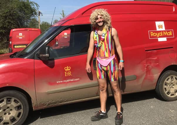 Postman Rob Davenport who raised £1,500 for the NHS by doing his round in fancy dress EMN-200526-102814001