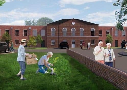 An artist's impression of the what the planned redevelopment of Melton's old St Mary's Hospital site might look like at the entrance to the site on Thorpe Road EMN-200526-154650001