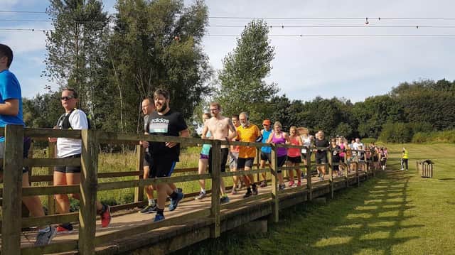Runners at Melton Country Park pre-lockdown. Photo: Tim Williams