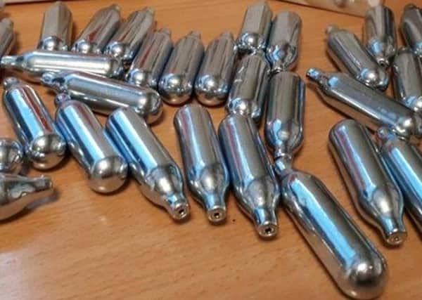 Nitrous Oxide Canisters, which give a 'laughing gas' high but can have dangerous side effects EMN-200806-084934001
