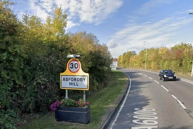 Asfordby Hill road sign EMN-201006-180240001
