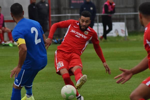 Nathan Arnold in action for Melton Town. Photo: Tim Williams