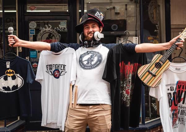 Tom Griggs outside his shop in King Street, Melton.