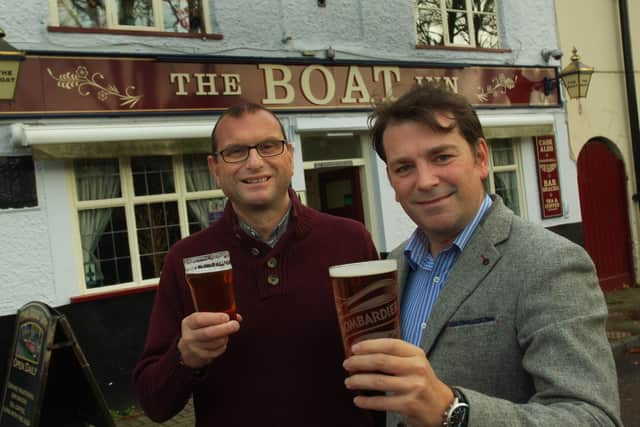 Melton Council deputy leader, Councillor Leigh Higgins (right), who is keen to boost the viability of local pubs, pictured with Kevin Billson, of Melton CAMRA, before the recent lockdown EMN-200624-121555001