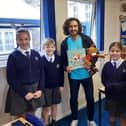 Body coach Joe Wicks visits Buckminster Primary School to promote his new children's book EMN-211110-130448001