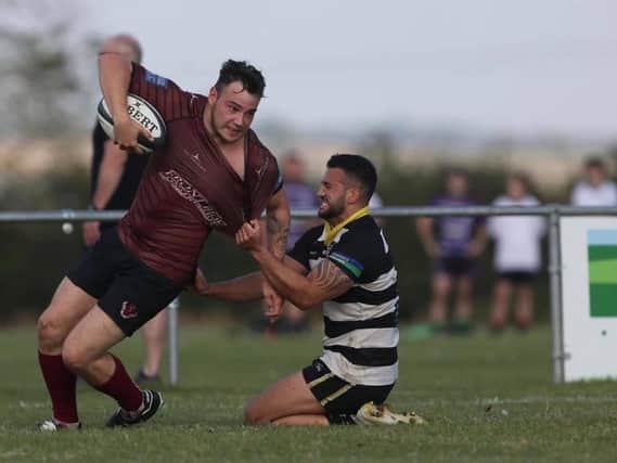 Action from Melton Mowbray's victory over Rushden and Higham.