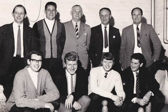 The late Ian White (on left of front row) pictued with Holwell Works skittles team in the 1960s EMN-211015-171407001