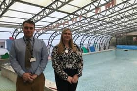 Nathan Odom, head of estates and admissions for Discovery Schools, and Sarah Sadler, executive head at Asfordby Captain's Close School, pictured by the school swimming pool EMN-211019-155142001